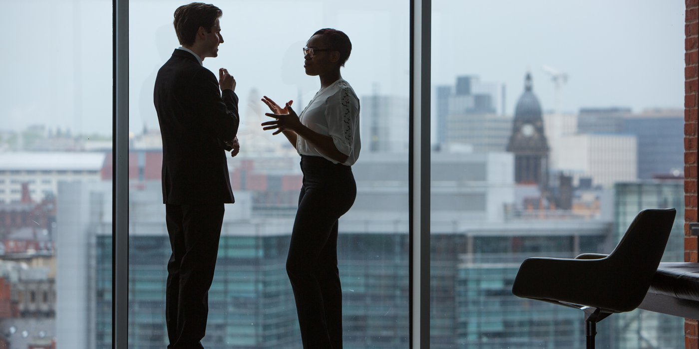 man and woman in Leeds city centre office