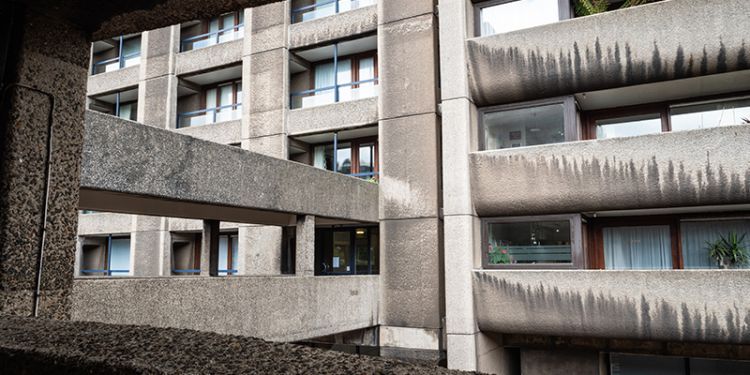 Photograph of a block of concrete flats in Brutalist style.