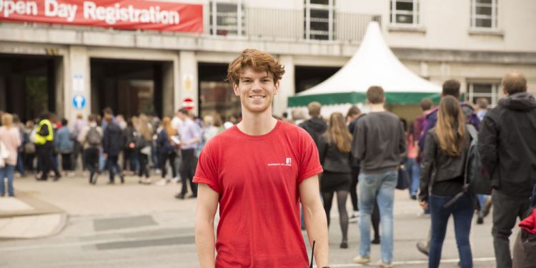 A university open day ambassador smiling