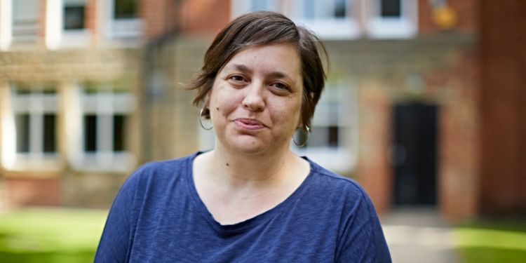 Dr Paula Clarke stands in front of Hilary Place at the University of Leeds