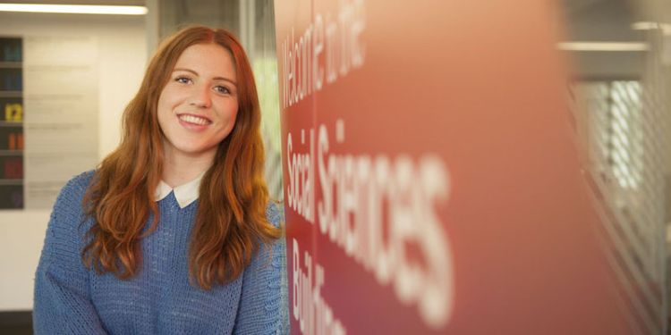 undergraduate student pictured in the Social Sciences Building