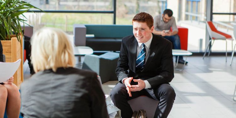 Students in suits in law school