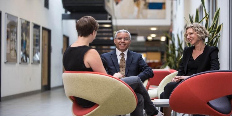 academic staff in seating area in the Liberty Building