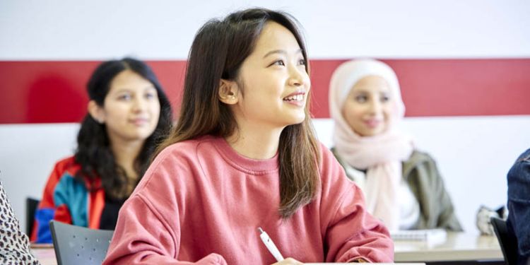 Student in seminar in Social Sciences building