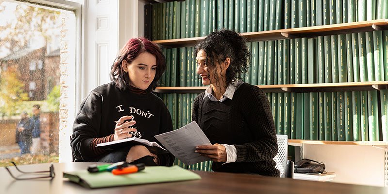 Student and academic in academic office