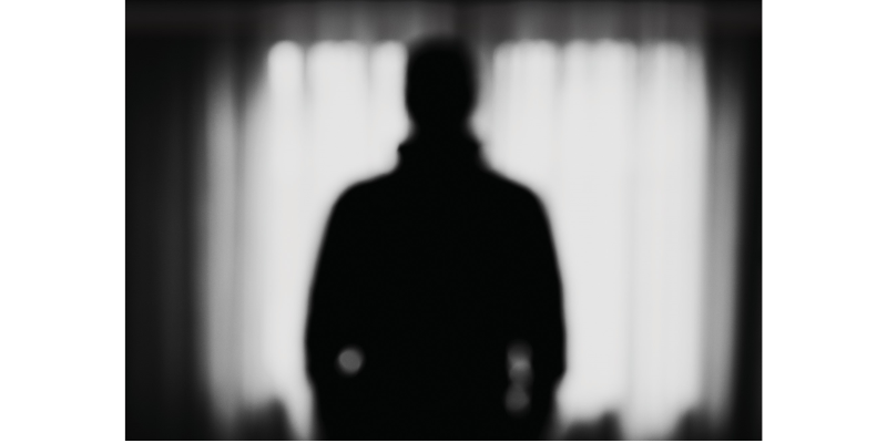 Image of shadowy figure