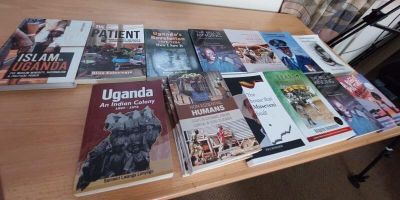 Photograph of books on Uganda.