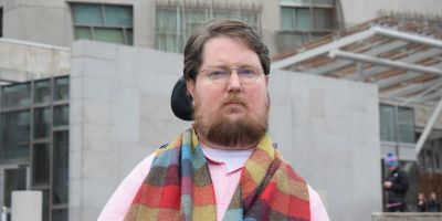 Dr Miro Griffiths outside the Sociology building