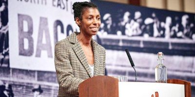 Photograph of Dame Sharon White mid-lecture.