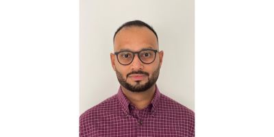 Man wearing red and white check shirt