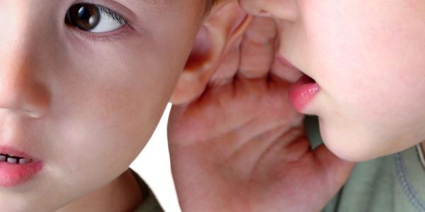 Children whispering