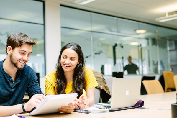 Postgraduate researchers working together