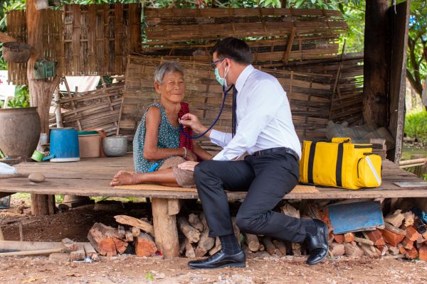 An image of a doctor tending to a patient
