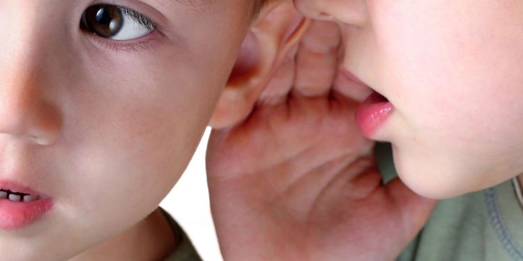 Children whispering