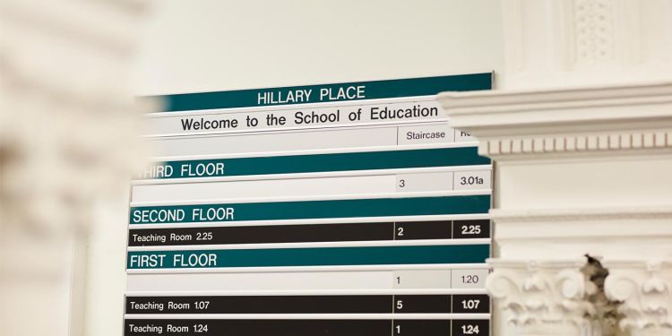 Hillary Place welcome sign