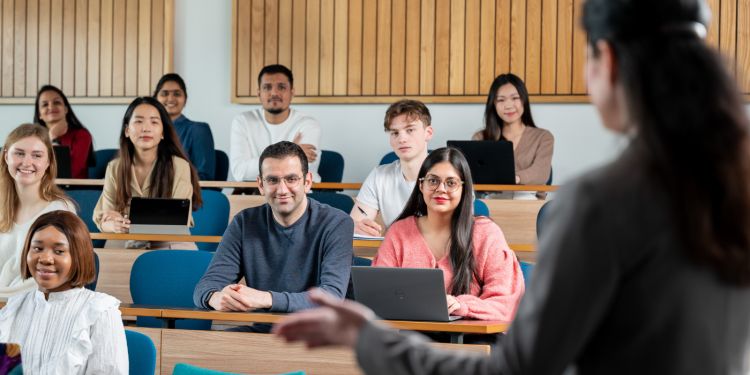 Mix of mature students in lecture space