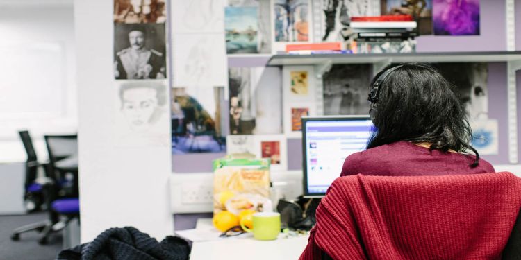 Person sitting at a computer