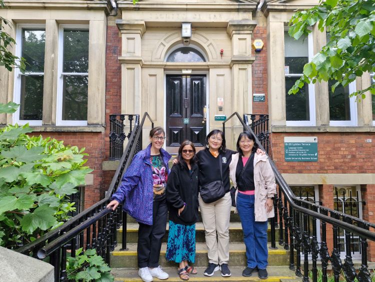 The four friends outside the School of Law’s original home on Lyddon Terrace 