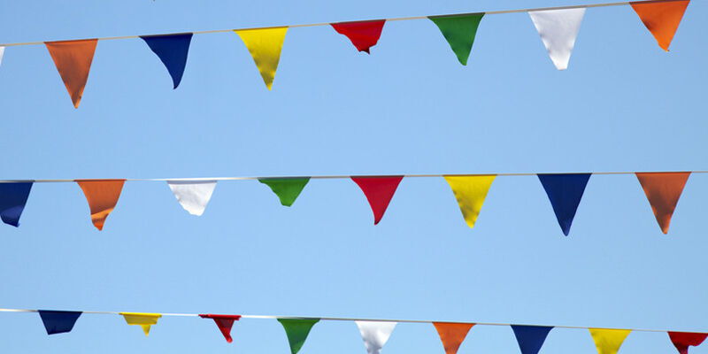 Multicoloured flags outside the students union