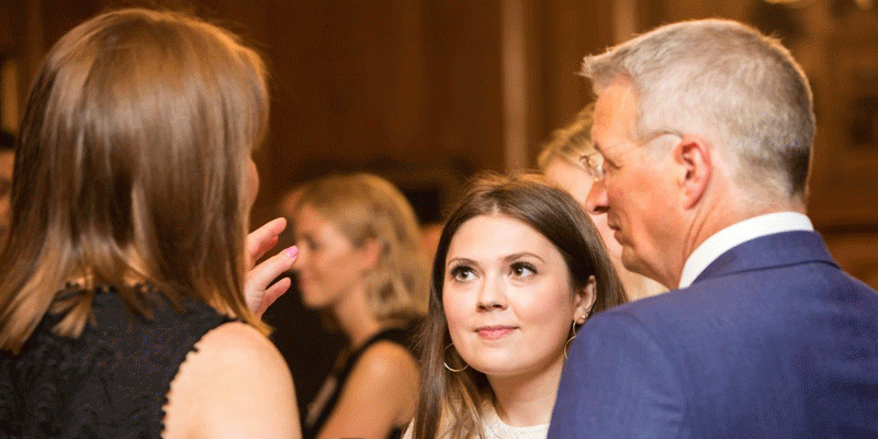 student, staff and alumni at an alumni event